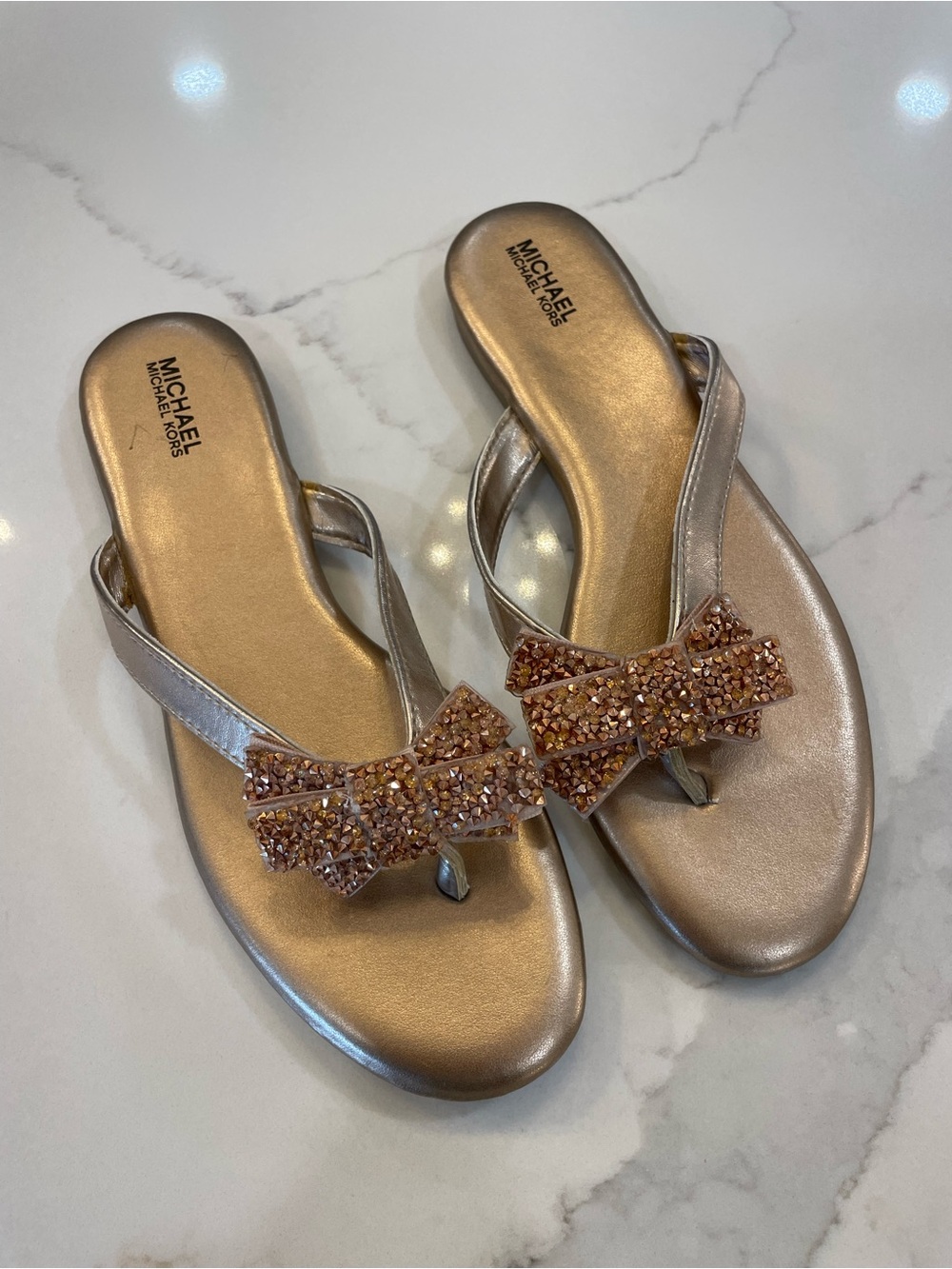 Brand New w/out tags Michael Kors Metallic Rose Gold Crystal Bow Thong Sandals